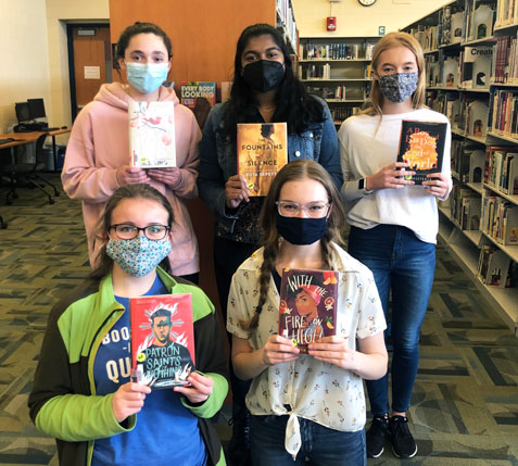 Photo of five students on Battle of the Books team