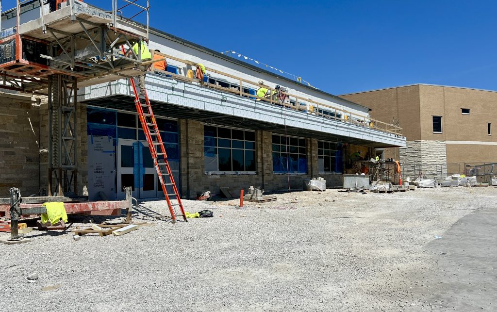 exterior of Hamilton high school cafeteria under construction. the windows are now in place.