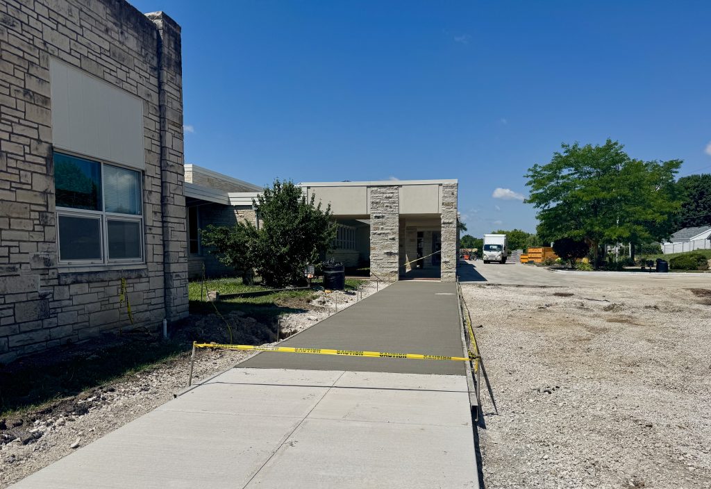 fresh sidewalk outside of lannon elementary school