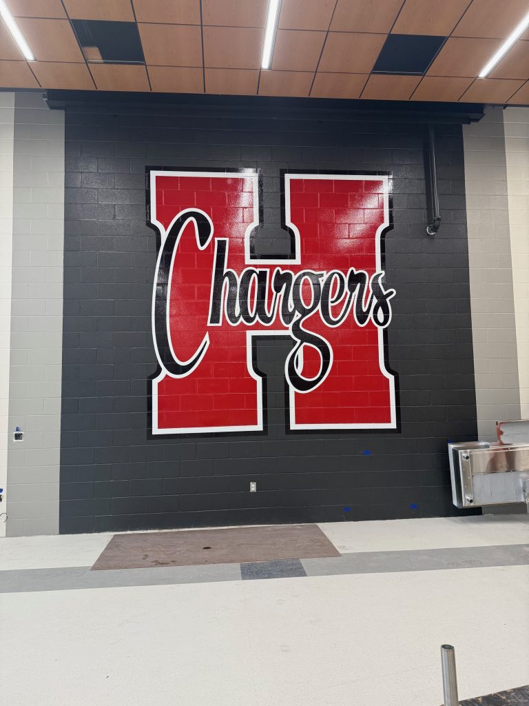 newly painted chargers h logo in Hamilton high school cafeteria