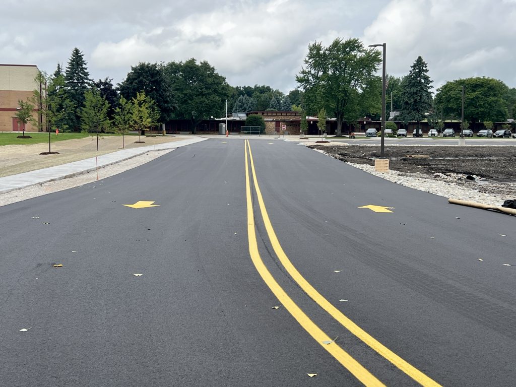 newly paved two way parking lot at maple avenue elementary