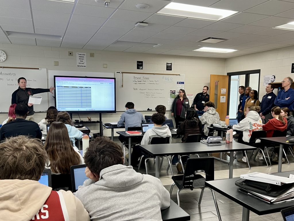 Chamber of Commerce members visit a business education class